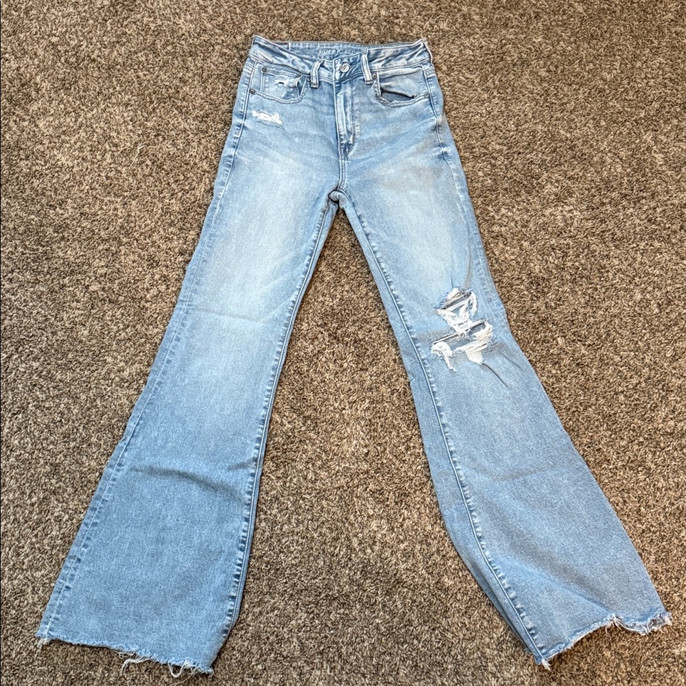 American Eagle Outfitters Super High-Rise Flare Jeans - Light Blue. Size 6 long